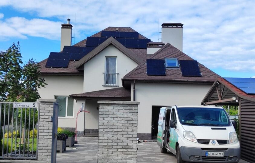 residential house with rooftop solar panels